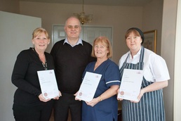 Claire Walton (RGN) and Louise Barlow (Catering supervisor) with CMI trainer Mike Smith