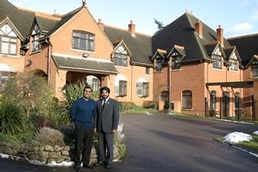 The Gidar brothers outside Heath Lodge care home in Welwyn, Hertfordshire