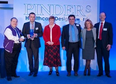 Staff from Harper Fields collect the Best Large Care Home award