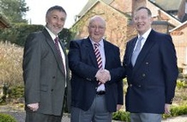 Arthur Ware, centre, retired after 17 years with Coverage Care Services