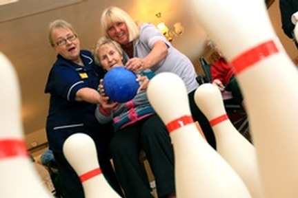 The Sheffield Care Home Games: Left to right Sandra Galloway, nurse, 74-year-old Mary Hutchinson, resident and Linda Reynolds, activities co-ordinator  