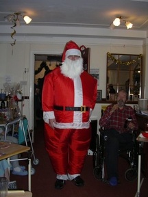 Father Christmas drops into a Regal care home to enjoy the festivities