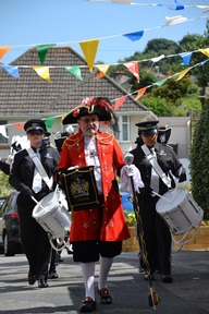 Town crier and Meridian of Corps marching band open the fete
