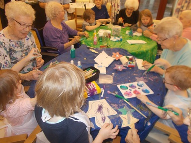 Ballerup nursery pupils and staff with residents of Rosaburn House