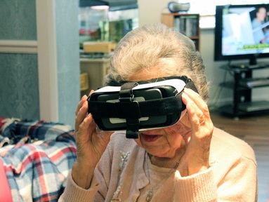 100-year-old Garden Hill Care Home resident Lily enjoying a virtual reality reminiscence session