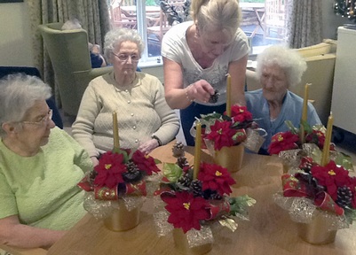 Residents at Ideal Carehomes' Ash Tree House make Christmas table decorations