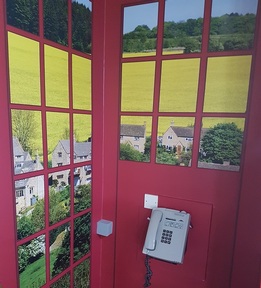 Working telephone with countryside views creates a village atmosphere