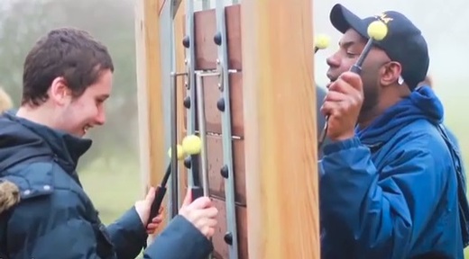 Pupil and staff member have fun in the video