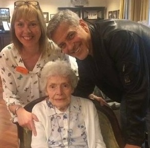Care worker Linda Jones and resident Pat Adams with George Clooney. Credit: Sunrise UK