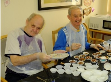 John and Ray, residents at Watling Court Extra Care Housing Scheme, take part in Easter bake off Credit: Abbeyfield Kent