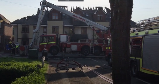 Image from film footage of firefighters on site Credit: Evening Standard