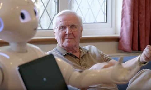 A Pepper robot filmed talking with elderly man at home. Credit: BBC