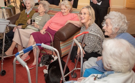 Caroline Dinenage with residents at Arden Grove care home. Credit: Accord.
