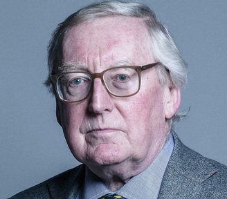 Lord Norman Warner.