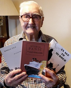 William Glen poses with his published novels. Credit: Bield Housing and Care.