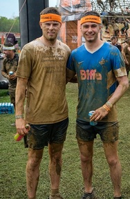Conor Ryder (left). Credit: Tough Mudder