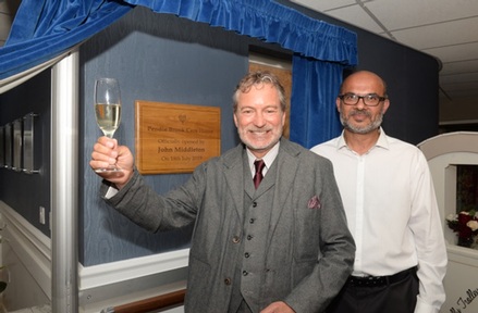 Actor John Middleton with a director at Rochcare Athar Mahmood. Credit: Rochcare