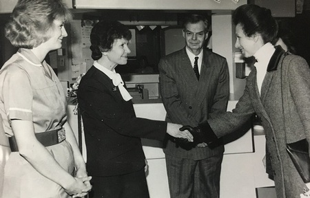 Ms Allen meeting Princess Ann when she was a midwife Credit: CQC