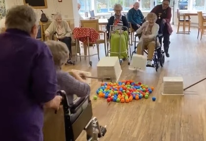 Residents at Bryn Celyn Care Home playing Hungry Hippos.  Credit: Bryn Celyn Care Home
