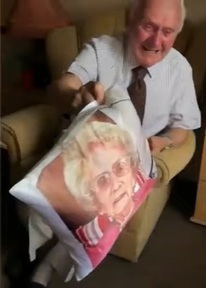 Ken Benbow with a cushion bearing his late wife Ada's face. Credit: Thistleton Lodge