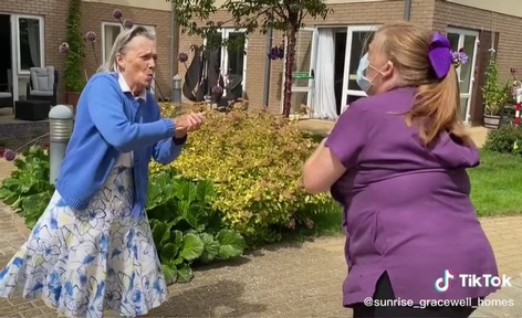 Resident at Gracewell of Weymouth care home grooves to 'Do You Wanna Dance' song by Cliff Richard. Credit: Gracewell of Weymouth.