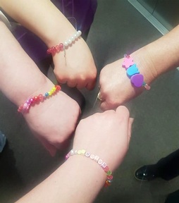 Staff at Oakwood Grange wearing the friendship bracelets made by Jess Nolan. Credit: Donna Harrison-Rhodes/Anchor Hanover.