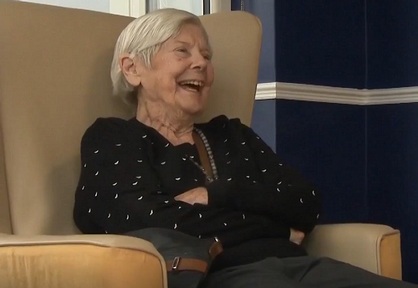 Resident Audrey's face beams when she sees her daughter Shelly enter the care home. Credit: Adam Purnell