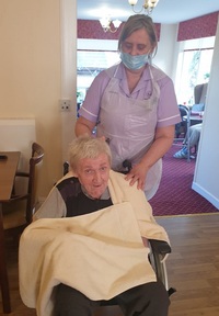 Resident Billy Sharkey and care worker Carolina Ruiz. Credit: Mansfield Care Ltd