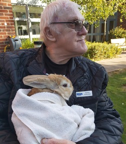 Resident Brian Lace, who looks after the care home's rabbits