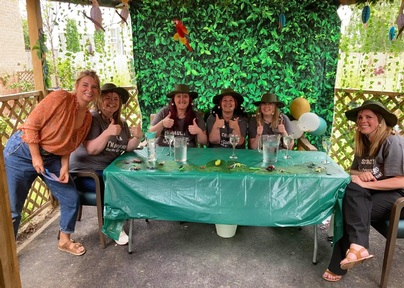 The staff at Windsor Court care home smiling before their 10-course bushtucker trial begins: Credit: Ideal Carehomes Ltd