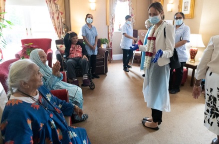 Care minister Helen Whately with residents. Credit: Karuna Manor