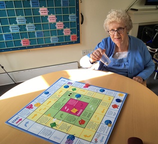 Sylvia, a resident at Boultham Park House care home plays Tripology