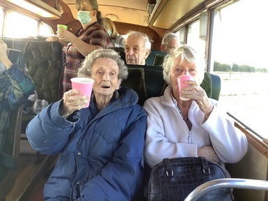 Residents enjoying their champagne vintage bus tour. Credit: Rosebank Care Home.