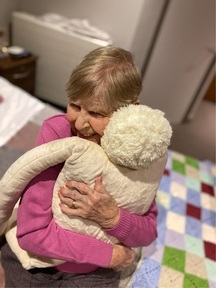 Enid Platt, resident at The Hamptons Care Centre said it was “love in a hug.” Credit: New Care.