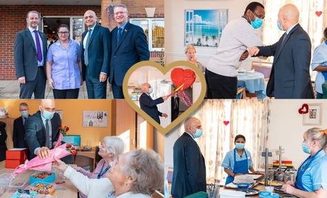 Sajid Javid smashes a heart-shaped pinata. Credit: DHSC
