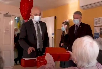 Credit: Health Secretary Sajid Javid receives a gift from a resident on Valentine's Day. Credit: DHSC