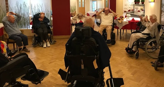 Ken leads care home exercise class.  Credit: Royal Star & Garter.