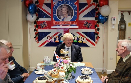 Boris Johnson poured tea for residents at the care home's Jubilee party. Credit: gov.uk