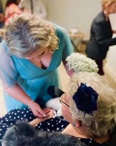 Bride Diana Bowie hugs mum Susan Barrett. Credit: Joanna Jankowska