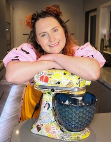 Great British Bake off TV star Lizzie Acker has openly shared how dyslexia has affected her life. Credit: CIC