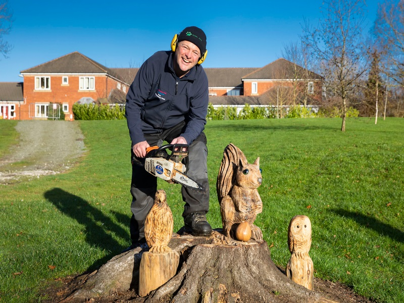 Paul Morris with some of his other sculptures at Pendine Park care home