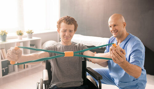 A younger adult working out in a care home for younger adults