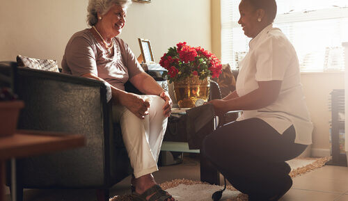 A lady in her homely room in a care home